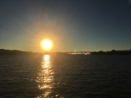 Sol och Vättern samt Motalabron i bakgrunden Sol och Vätternsamt Motalabron i bakgrunden