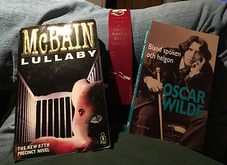 Böckerna Lullaby och Bland spöken och helgon