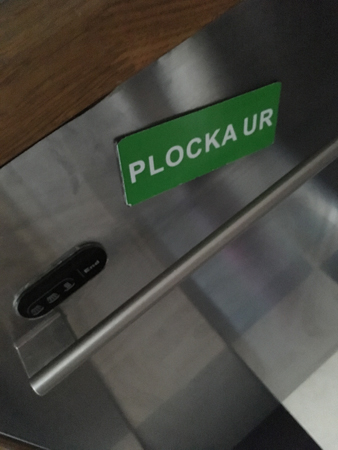 Skylten plocka ur på diskmaskinen