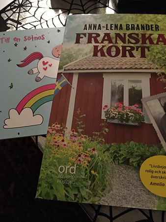Sötnoskort och boken Franska kort