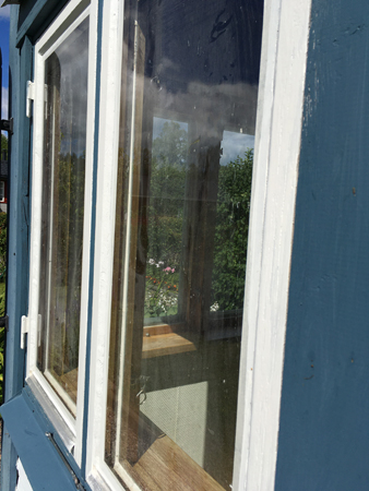 Grundmålade fönster