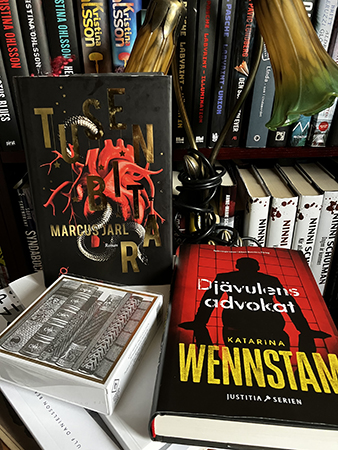 Böckerna Tusen bitar och Djävulens advokat