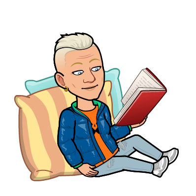 Bitmoji Tofflan läser med kuddar bakom ryggen