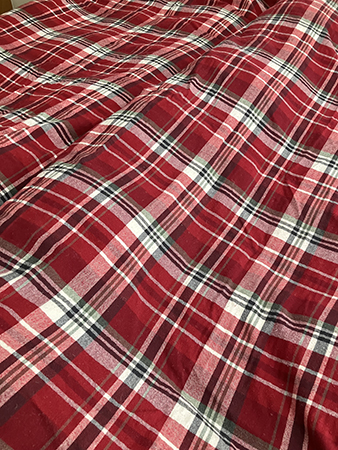 Renbäddat i rödrutig flanell