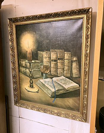 Tavla med böcker och stearinljus