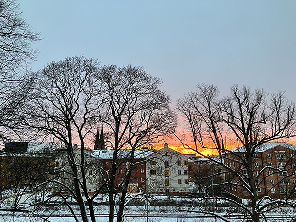 Solnedgång med domkyrkotornen i bakgrunden