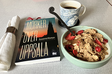 Filfrukost med mörker över Uppsala