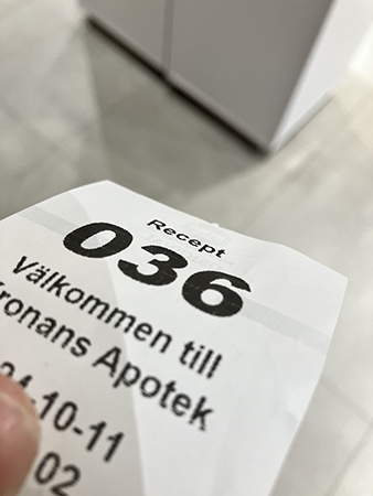 Nummerlapp på apoteket