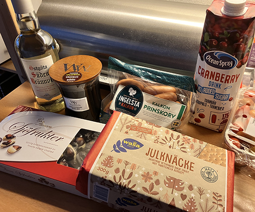 Östgöta sädes Woodwickljus sjöfrukter kalkonprinskorv julknäcke tranbärsdricka