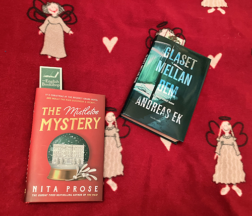Böckerna The Mistletoe Mystery o Glaset mellan dem