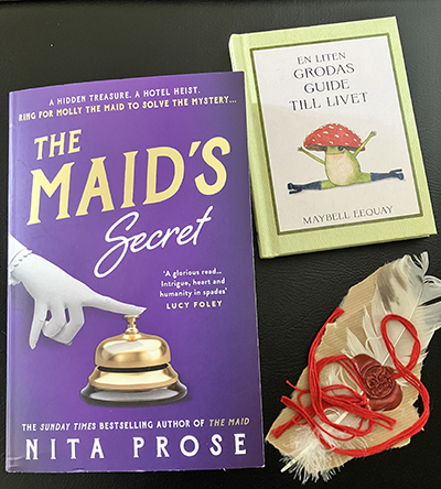 Böckerna The Maid's Secret o En liten grodas guide till livet