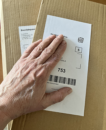 Två paket med min hand på