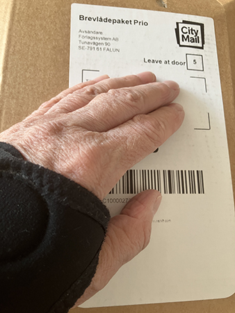 Min hand på bokpaket